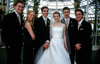The cast of American Wedding fakes smiles about Knocked Up's performance.