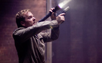 Gee, I've never seen Kiefer Sutherland hold a gun before. 